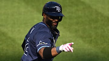 Tampa Bay Rays first baseman Yandy Diaz (2) celebrates while rounding the bases after hitting a home run during the fourth inning against the Baltimore Orioles at Oriole Park at Camden Yards. 