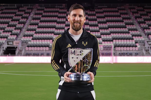 Lionel Messi with the 2024 MLS MVP award.