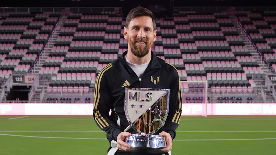 Lionel Messi with the 2024 MLS MVP award.