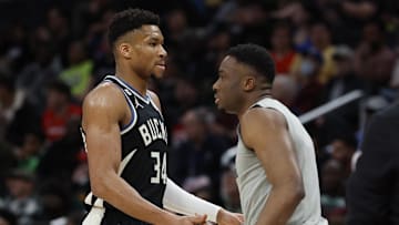 Mar 5, 2023; Washington, District of Columbia, USA; Milwaukee Bucks forward Giannis Antetokounmpo (34) shakes hands with Bucks forward Thanasis Antetokounmpo (43) against the Washington Wizards at Capital One Arena. Mandatory Credit: Geoff Burke-Imagn Images
