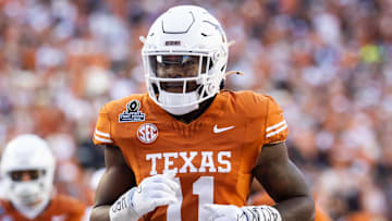 Dec 21, 2024; Austin, Texas, USA; Texas Longhorns linebacker Colin Simmons (11) against the Clemson Tigers during the CFP National playoff first round at Darrell K Royal-Texas Memorial Stadium.