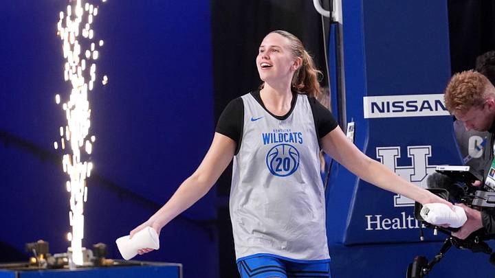 Kentucky’s Kaelyn Carroll comes out onto the court as the Blue and White team scrimmaged each other in Memorial Coliseum Friday night.
Oct. 17, 2025