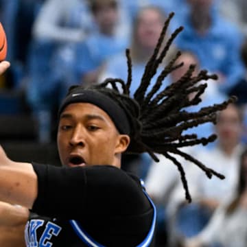 Duke forward Maliq Brown gets a rebound.