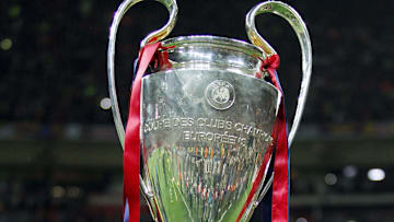 May 28, 2011; London, ENGLAND; FC Barcelona defenseman Gerard Pique celebrates with the championship trophy after defeating Manchester United 3-1 in the 2011 UEFA Champions League final at Wembley Stadium. Mandatory Credit: Walter Luger/GEPA via Imagn Images