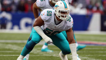 Miami Dolphins defensive end Olivier Vernon (50) waits for the snap against the Buffalo Bills at Ralph Wilson Stadium in 2013.