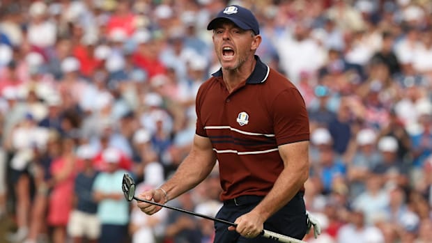 Team Europe's Rory McIlroy celebrates after holing his putt on the 14th hole during Saturday four-balls at the Ryder Cup.
