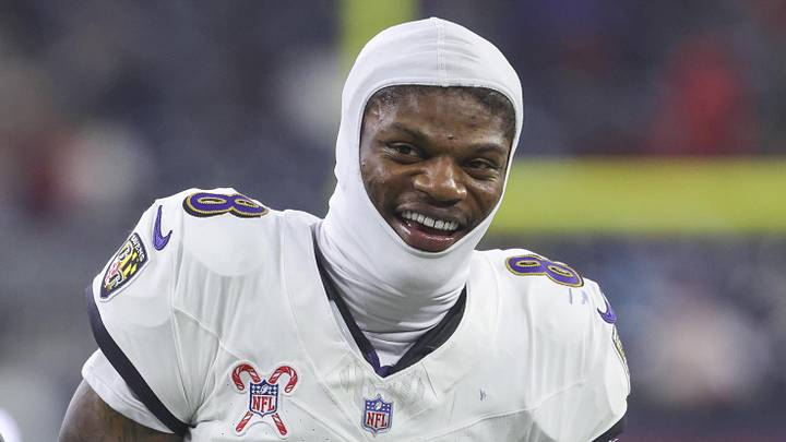Dec 25, 2024; Houston, Texas, USA;  Baltimore Ravens quarterback Lamar Jackson (8) smiles during the fourth quarter against the Houston Texans at NRG Stadium. Mandatory Credit: Troy Taormina-Imagn Images