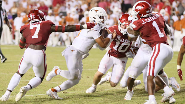 Texas Longhorns quarterback Casey Thompson (11) rushes for a touchdown