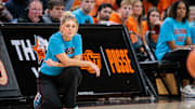 Nov 9, 2025; Stillwater, Oklahoma, USA; Oklahoma State Cowgirls coach Jaycie Hoyt watches game play during the first half against the Oral Roberts Golden Eagles at Gallagher-Iba Arena. Mandatory Credit: William Purnell-Imagn Images
