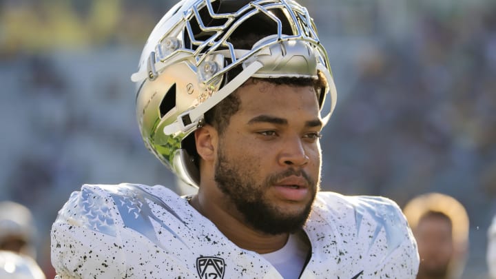 Nov 18, 2023; Tempe, Arizona, USA; Oregon Ducks offensive lineman Nishad Strother (50) against the Arizona State Sun Devils at Mountain America Stadium. Mandatory Credit: Mark J. Rebilas-USA TODAY Sports