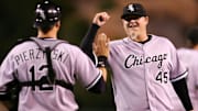 Chicago White Sox catcher A.J. Pierzynski (12) and closer Bobby Jenks (45) celebrate the White Sox 6-1 victory against the Los Angeles Angels at Angel Stadium of Anaheim.