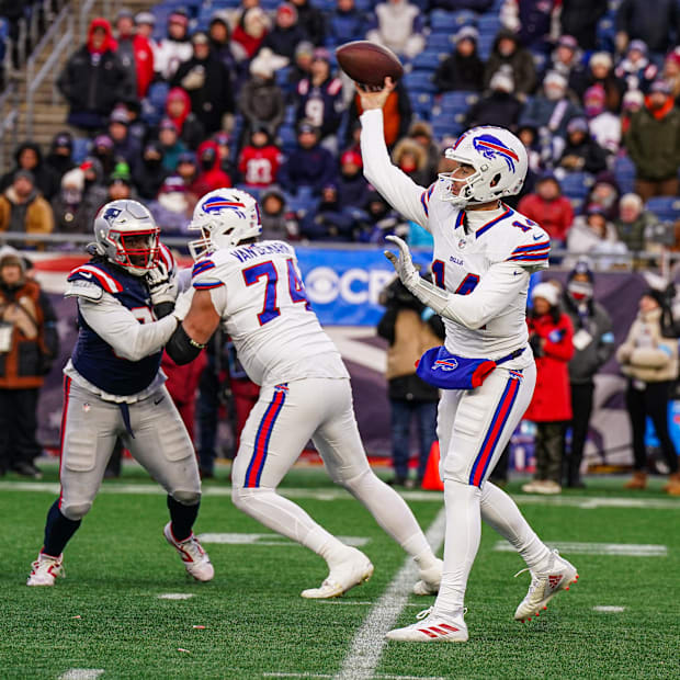 Mike White (14) throws a pass