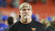 Nov 2, 2025; Landover, Maryland, USA; Washington Commanders head coach Dan Quinn walks off the field after the loss to Seattle Seahawks at Northwest Stadium. Mandatory Credit: Amber Searls-Imagn Images
