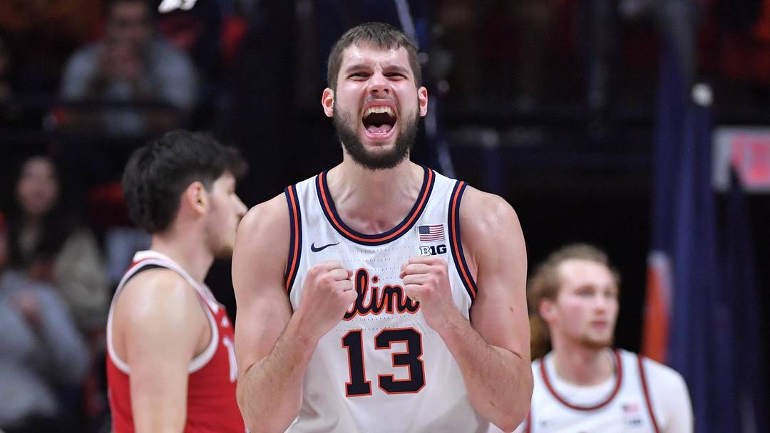 Dec 13, 2025; Champaign, Illinois, USA;  Illinois Fighting Illini center Tomislav Ivisic (13) reacts after scoring during the second half against the Nebraska Cornhuskers at State Farm Center. Mandatory Credit: Ron Johnson-Imagn Images