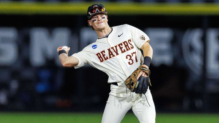 Jun 9, 2024; Lexington, KY, USA; Oregon State Beavers infielder Travis Bazzana (37) throws the ball during the second inning against the Kentucky Wildcats at Kentucky Proud Park. Mandatory Credit: Jordan Prather-USA TODAY Sports