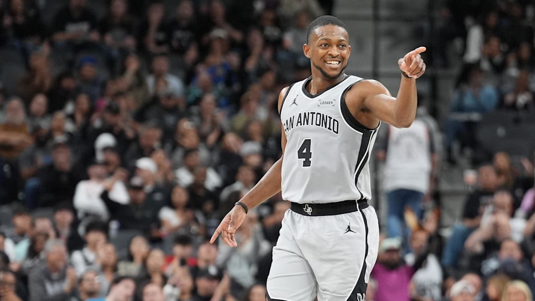 Mar 8, 2026; San Antonio, Texas, USA; San Antonio Spurs guard De'Aaron Fox (4) celebrates in the second half against the Houston Rockets at Frost Bank Center.