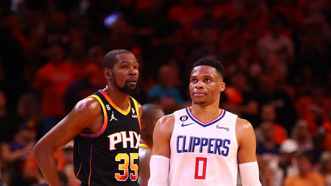 Apr 25, 2023; Phoenix, Arizona, USA; Los Angeles Clippers guard Russell Westbrook (0) against Phoenix Suns forward Kevin Durant (35) during game five of the 2023 NBA playoffs at Footprint Center. Mandatory Credit: Mark J. Rebilas-Imagn Images