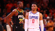 Apr 25, 2023; Phoenix, Arizona, USA; Los Angeles Clippers guard Russell Westbrook (0) against Phoenix Suns forward Kevin Durant (35) during game five of the 2023 NBA playoffs at Footprint Center. Mandatory Credit: