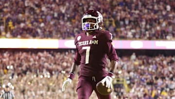 Texas A&M Aggies wide receiver KC Concepcion (7) returns a punt for a touchdown during the second half against the Louisiana State Tigers at Tiger Stadium. Mandatory Credit: Stephen Lew-Imagn Images