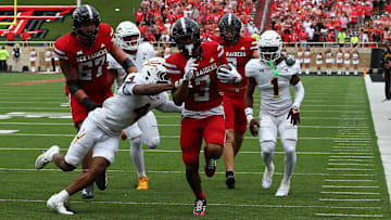 Sep 21, 2024; Lubbock, Texas, USA;  Texas Tech Red Raiders wide receiver Josh Kelly (3) runs the ball against Arizona State Sun Devils defensive safety Myles Rowser (4) in the first half at Jones AT&T Stadium and Cody Campbell Field. Mandatory Credit: Michael C. Johnson-Imagn Images