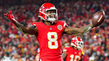 Dec 8, 2024; Kansas City, Missouri, USA; Kansas City Chiefs wide receiver DeAndre Hopkins (8) celebrates after scoring against the Los Angeles Chargers during the first half at GEHA Field at Arrowhead Stadium. Mandatory Credit: Denny Medley-Imagn Images