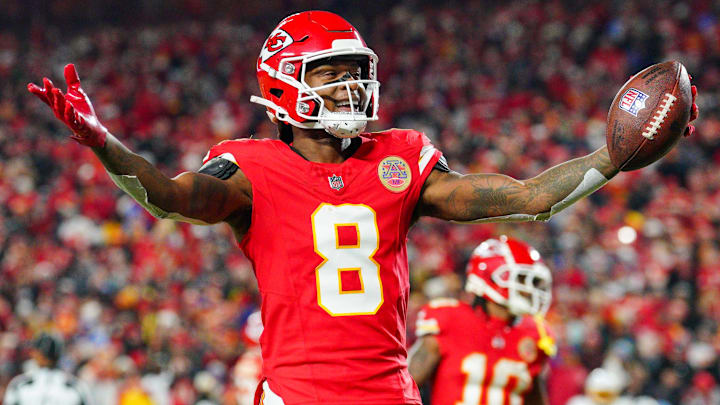 Dec 8, 2024; Kansas City, Missouri, USA; Kansas City Chiefs wide receiver DeAndre Hopkins (8) celebrates after scoring against the Los Angeles Chargers during the first half at GEHA Field at Arrowhead Stadium. Mandatory Credit: Denny Medley-Imagn Images