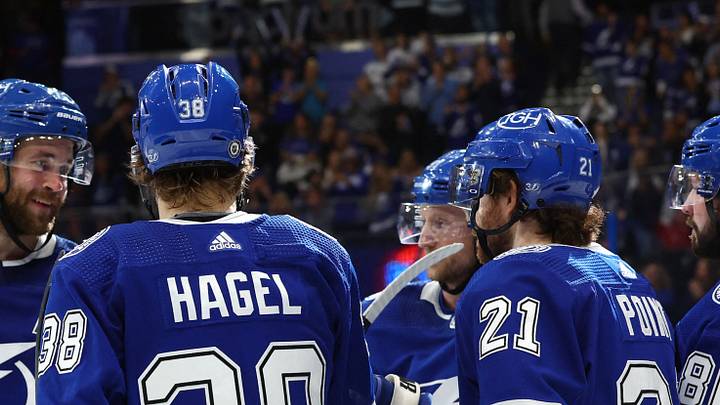 Feb 21, 2023; Tampa, Florida, USA; Tampa Bay Lightning center Brayden Point (21) is congratulated by right wing Nikita Kucherov (86) and left wing Brandon Hagel (38) and center Steven Stamkos (91) and defenseman Victor Hedman (77) after he scored a goal against the Anaheim Ducks during the third period at Amalie Arena. Mandatory Credit: Kim Klement-USA TODAY Sports Feb 21, 2023; Tampa, Florida, USA; Tampa Bay Lightning center Brayden Point (21) is congratulated by right wing Nikita Kucherov (86) and left wing Brandon Hagel (38) and center Steven Stamkos (91) and defenseman Victor Hedman (77) after he scored a goal against the Anaheim Ducks during the third period at Amalie Arena. Mandatory Credit: Kim Klement-USA TODAY Sports