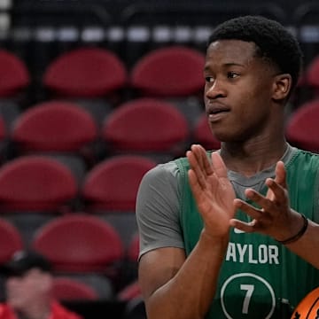 Mar 20, 2025; Raleigh, NC, USA; Baylor Bears guard VJ Edgecombe (7) reacts during practice at Lenovo Center. Mandatory Credit: Bob Donnan-Imagn Images