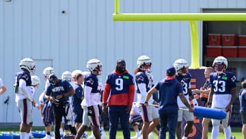 Aug 3, 2023; Foxborough, MA, USA; New England Patriots linebacker Matthew Judon (9) waits with the defense for the start of a drill at training camp at Gillette Stadium.  Mandatory Credit: Eric Canha-USA TODAY Sports