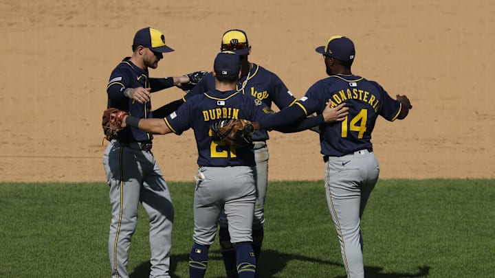 Aug 3, 2025; Washington, District of Columbia, USA; The Milwaukee Brewers infield celebrates after their game against the Washington Nationals at Nationals Park. Mandatory Credit: Geoff Burke-Imagn Images