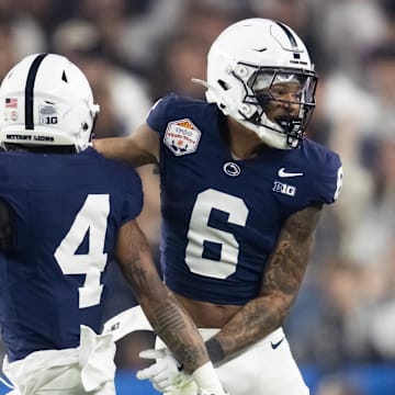 Penn State Nittany Lions cornerback A.J. Harris (4) and safety Zakee Wheatley (6) celebrate a play against the Boise State Broncos during the Fiesta Bowl.