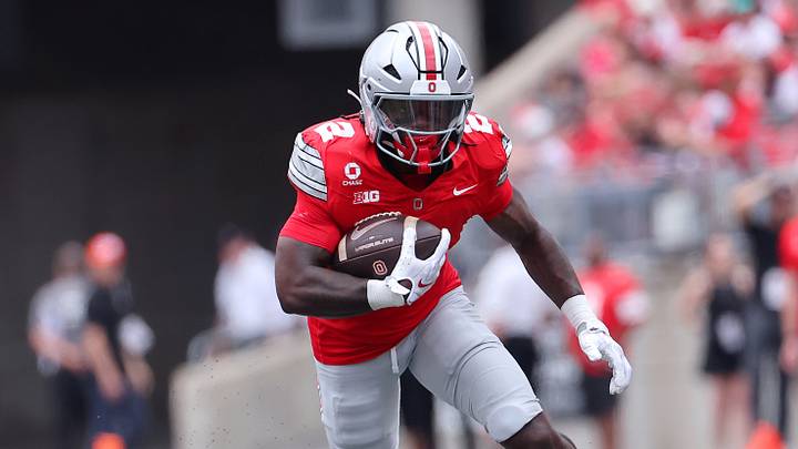 Sep 5, 2026; Columbus, Ohio, USA;  Ohio State Buckeyes running back Legend Bey (2) runs for a touchdown during the fourth quarter against the Ball State Cardinals at Ohio Stadium.  Mandatory Credit: Joseph Maiorana-Imagn Images