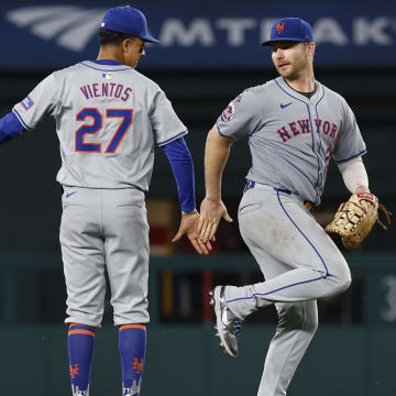 Jun 4, 2024; Washington, District of Columbia, USA; New York Mets third base Mark Vientos (27) celebrates with Mets first base Pete Alonso (20) after their game against the Washington Nationals at Nationals Park.