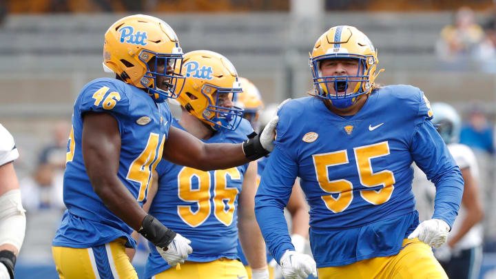 Sep 24, 2022; Pittsburgh, Pennsylvania, USA;  Pittsburgh Panthers defensive lineman Sean FitzSimmons (55) celebrates his sack with fellow defensive linemen Sam Williams (46) and Chris Maloney (96) against at Acrisure Stadium. Mandatory Credit: Charles LeClaire-USA TODAY Sports