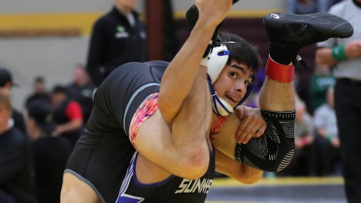 Sunnyside (AZ) wrestler Adyn Bostick (right) wrestling in the 2024 Walsh Ironman. This past week he pulled off an upset of Delbarton's (NJ) Ryan DeGeorge at Hall of Fame Dual Classic in Oklahoma. Sunnyside (AZ) wrestler Adyn Bostick (right) wrestling in the 2024 Walsh Ironman. This past week he pulled off an upset of Delbarton's (NJ) Ryan DeGeorge at Hall of Fame Dual Classic in Oklahoma.