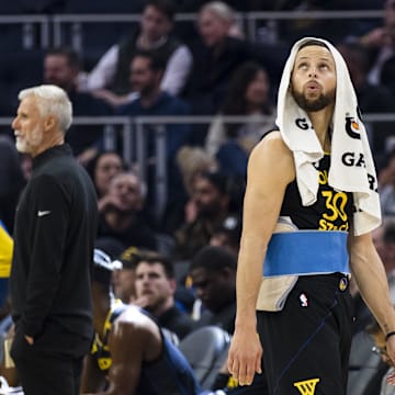 Mar 20, 2025; San Francisco, California, USA; Golden State Warriors guard Stephen Curry (30) watches a replay during a review of call during the first quarter against the Toronto Raptors at Chase Center. Mandatory Credit: John Hefti-Imagn Images
