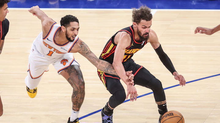 Feb 12, 2025; New York, New York, USA; New York Knicks guard Cameron Payne (1) and Atlanta Hawks guard Trae Young (11) fight for a loose ball in the fourth quarter at Madison Square Garden. Mandatory Credit: Wendell Cruz-Imagn Images Feb 12, 2025; New York, New York, USA; New York Knicks guard Cameron Payne (1) and Atlanta Hawks guard Trae Young (11) fight for a loose ball in the fourth quarter at Madison Square Garden. Mandatory Credit: Wendell Cruz-Imagn Images