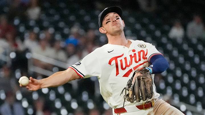 Sep 15, 2026; Minneapolis, Minnesota, USA;  Minnesota Twins third baseman Brooks Lee (22) fields a ball hit by New York Yankees catcher Ali Sanchez (not pictured) and puts him out in the ninth inning at Target Field.  Mandatory Credit: Bruce Kluckhohn-Imagn Images