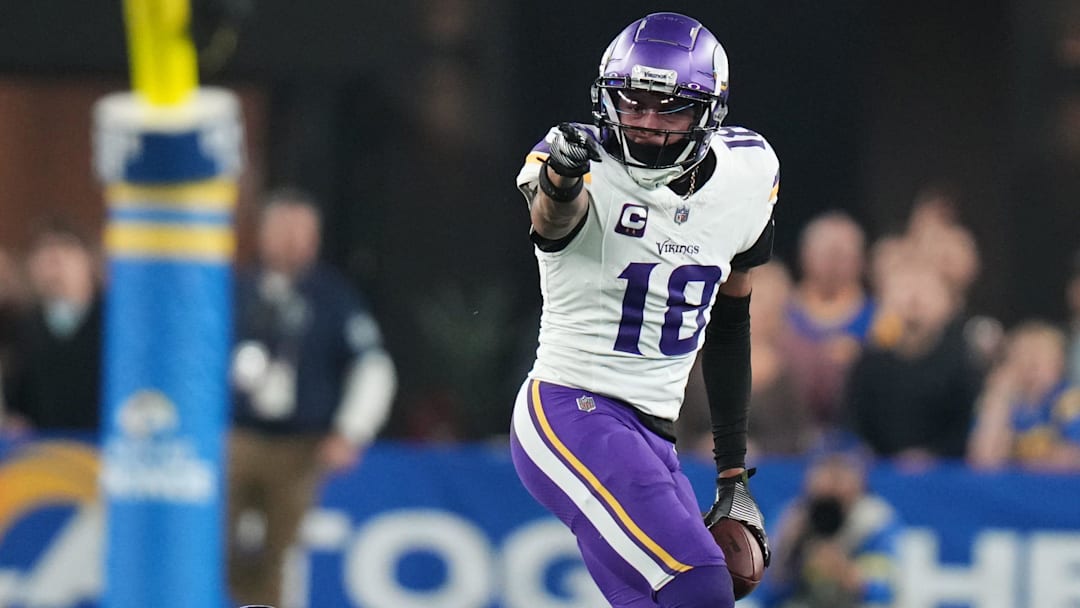 Minnesota Vikings receiver Justin Jefferson (18) signals a first down after a catch against the Los Angeles Rams during their playoff game at State Farm Stadium on Jan. 13, 2025, in Glendale.