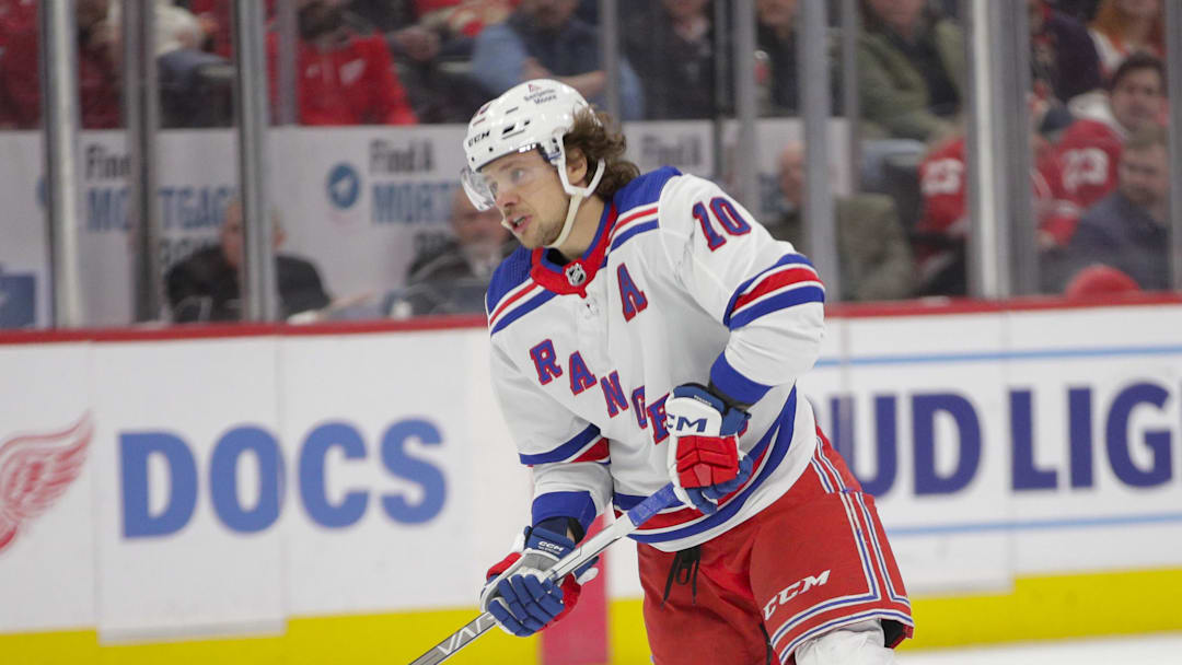 Feb 23, 2023; Detroit, Michigan, USA; New York Rangers left wing Artemi Panarin (10) against the Detroit Red Wings at Little Caesars Arena. Mandatory Credit: Brian Bradshaw Sevald-Imagn Images
