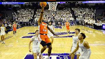 Dec 6, 2024; Evanston, Illinois, USA; Illinois Fighting Illini guard Kylan Boswell (4) scores against the Northwestern Wildcats during the second half at Welsh-Ryan Arena. Mandatory Credit: David Banks-Imagn Images