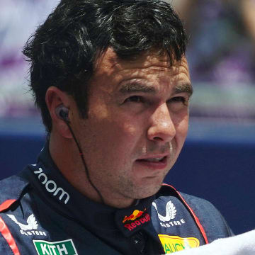 May 4, 2024; Miami Gardens, Florida, USA; Red Bull Racing driver Sergio Perez (11) reacts on the grid after the F1 Sprint Race at Miami International Autodrome. Mandatory Credit: John David Mercer-USA TODAY Sports