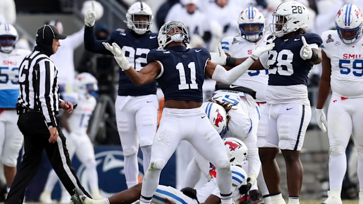 Penn State defensive end Abdul Carter (11) reacts after sacking SMU quarterback Kevin Jennings during their College Football Playoff game at Beaver Stadium. Penn State defensive end Abdul Carter (11) reacts after sacking SMU quarterback Kevin Jennings during their College Football Playoff game at Beaver Stadium.
