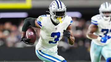 Dallas Cowboys wide receiver George Pickens runs to score a touchdown during the first half against the Las Vegas Raiders.
