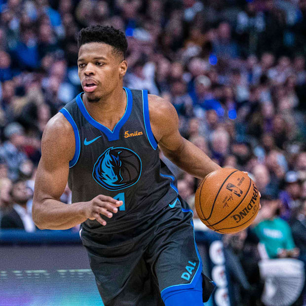 The Dallas Mavericks goalkeeper Dennis Smith Jr. 