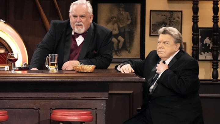 John Ratzenberger and George Wendt participate in a Cheers reunion moment during the 75th Emmy Awards. John Ratzenberger and George Wendt participate in a Cheers reunion moment during the 75th Emmy Awards.