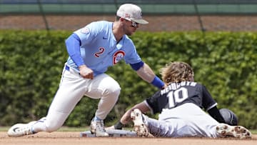 Chicago White Sox shortstop Chase Meidroth (10) steals second base as Chicago Cubs second baseman Nico Hoerner (2) applies the tag at Wrigley Field. 