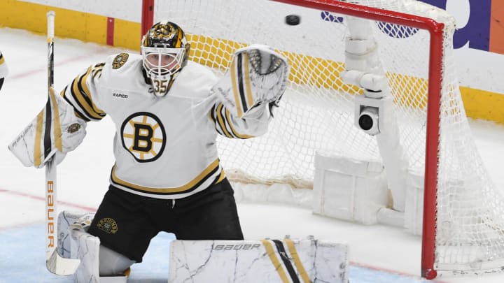 Apr 13, 2024; Pittsburgh, Pennsylvania, USA;  Boston Bruins goalie Linus Ullmark (35) makes a save against the Pittsburgh Penguins at PPG Paints Arena. Mandatory Credit: Philip G. Pavely-USA TODAY Sports