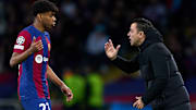 Lamine Yamal (left) was given his first team debut at Barcelona by Xavi Hernandez