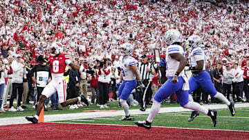 Sep 6, 2025; Madison, Wisconsin, USA;  Wisconsin Badgers wide receiver Vinny Anthony II (8) scores against the Middle Tennessee Blue Raiders during the second half at Camp Randall Stadium. Mandatory Credit: Kayla Wolf-Imagn Images